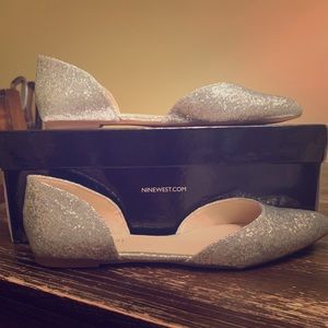 Size 6 1/2 Nine West silver cutout ballet flats.
